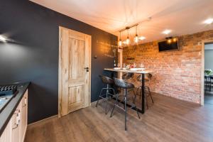Kuchyňa alebo kuchynka v ubytovaní Apartament Wita Stwosza