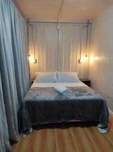 Pousada Container e Spa Mina Beer客房内的一张或多张床位