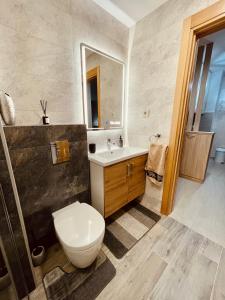 Kopalnica v nastanitvi NEO Apartman