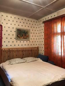 Postel nebo postele na pokoji v ubytování Kuberi guesthouse