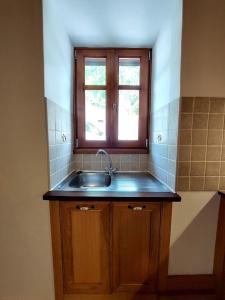 A kitchen or kitchenette at Casa de la Vita