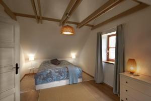 Krevet ili kreveti u jedinici u okviru objekta D4 Apartments Dörgicse