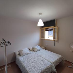 Llit o llits en una habitació de Apartamento Bajamar