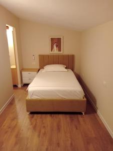 Letto o letti in una camera di Drini Hotel