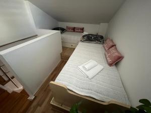Postel nebo postele na pokoji v ubytování Apartmani Pag Luxury 4U