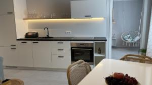 Kuchyň nebo kuchyňský kout v ubytování ViSun Apartment 3