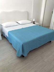 Кровать или кровати в номере B&B Porta Romana Amelia