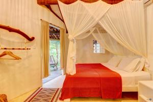 Кровать или кровати в номере Pousada Ilha Verde