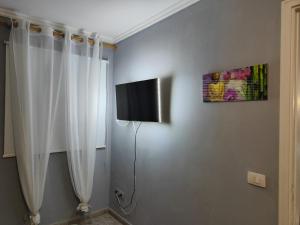 TV a/nebo společenská místnost v ubytování Tabaiba Sunset sea Views