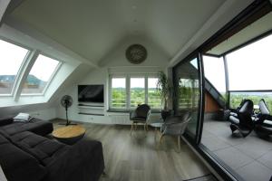Posezení v ubytování Apartments Metzingen Panoramablick