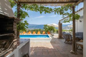 The swimming pool at or close to Villa Liviana, Piscina Barbacoa y preciosas vistas Málaga by CostaDelSolEscapes