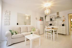 Kuchyň nebo kuchyňský kout v ubytování Sweet Home Apartaments