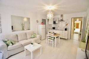 Kuchyň nebo kuchyňský kout v ubytování Sweet Home Apartaments