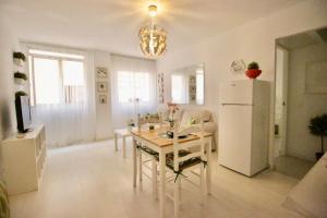 Kuchyň nebo kuchyňský kout v ubytování Sweet Home Apartaments