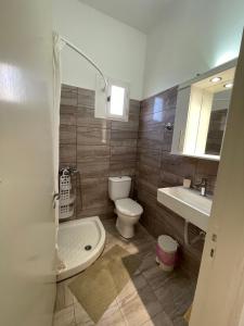 Koupelna v ubytování NAFSIKA Apartments