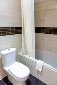 Koupelna v ubytování Mariandy Hotel