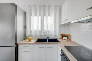 Kuchyň nebo kuchyňský kout v ubytování Cactus Guesthouse, Κίνι Συρος