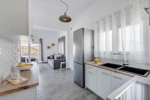 Kuchyň nebo kuchyňský kout v ubytování Cactus Guesthouse, Κίνι Συρος