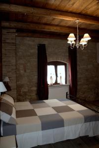 Posteľ alebo postele v izbe v ubytovaní Agriturismo Fonte Belvedere