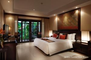 Ein Bett oder Betten in einem Zimmer der Unterkunft Bo Phut Resort and Spa - SHA Plus
