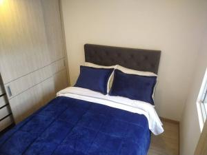 Cama o camas de una habitación en Apartamento en el cielo de Bogotá