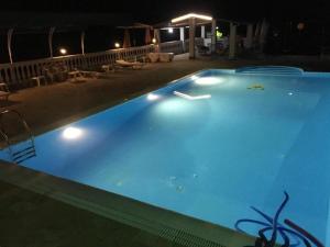 Bazén v ubytování Apartment in Mpenitses with Sea Views & Pool nebo v jeho okolí