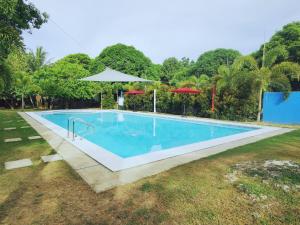Bazén v ubytování Medellin Seaview Inn nebo v jeho okolí