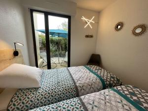 Fotografia z galérie ubytovania Appartement cosy avec terrasse, piscine et proche plage à La Rochelle - FR-1-246-627 v destinácii La Rochelle