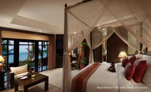 Ein Bett oder Betten in einem Zimmer der Unterkunft Bo Phut Resort and Spa - SHA Plus