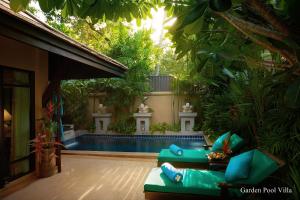 Ein Garten an der Unterkunft Bo Phut Resort and Spa - SHA Plus