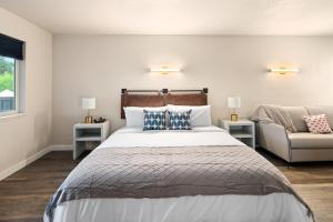 Ένα ή περισσότερα κρεβάτια σε δωμάτιο στο Hotel McCoy Pullman