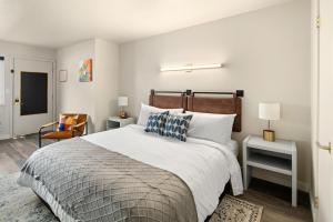 Ένα ή περισσότερα κρεβάτια σε δωμάτιο στο Hotel McCoy Pullman