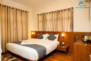 Postel nebo postele na pokoji v ubytování Hotel Dreams connect GRB