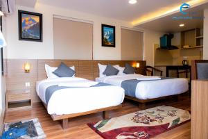 מיטה או מיטות בחדר ב-Hotel Dreams connect GRB