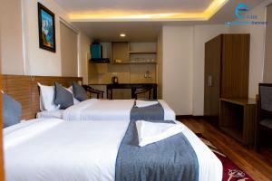 Postel nebo postele na pokoji v ubytování Hotel Dreams connect GRB