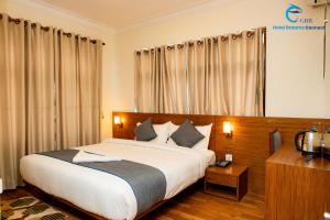 Postel nebo postele na pokoji v ubytování Hotel Dreams connect GRB