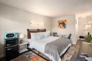 Ένα ή περισσότερα κρεβάτια σε δωμάτιο στο Hotel McCoy Pullman