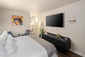 Ένα ή περισσότερα κρεβάτια σε δωμάτιο στο Hotel McCoy Pullman