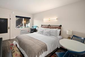 Ένα ή περισσότερα κρεβάτια σε δωμάτιο στο Hotel McCoy Pullman