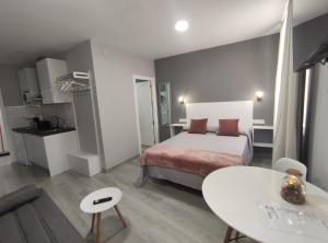 Kuchyňa alebo kuchynka v ubytovaní Apartamentos Harmonia