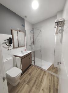 Kúpeľňa v ubytovaní Apartamentos Harmonia