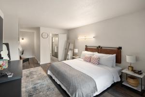 Ένα ή περισσότερα κρεβάτια σε δωμάτιο στο Hotel McCoy Pullman