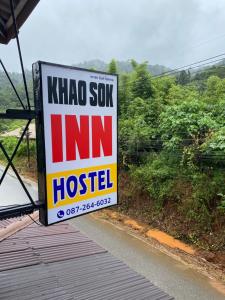 a sign for a kalo soup inn hospital at Khao Sok Inn Hostel in Khao Sok