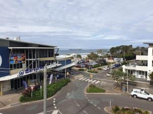 an aerial view of a street in front of a building at Beachfront penthouse in Maroochydore