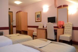 Ένα ή περισσότερα κρεβάτια σε δωμάτιο στο Hotel Tomce Sofka