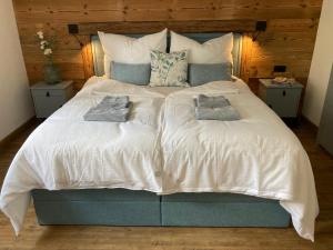 Кровать или кровати в номере Haus Angermann