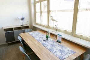 a table with a toy bottle on top of it at Villa Inga & Anne in Ahlbeck