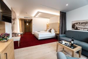 Postel nebo postele na pokoji v ubytování Hotel Hubertushof + 37 fotografií