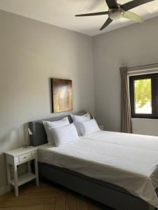 En eller flere senge i et værelse på Casa do Cerro Rental + 32 billeder