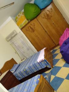 a bedroom with a bunk bed and a bedskirts at الساحل الشمالي in Borg El Arab